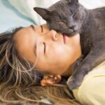 Why Does My Cat Sleep Pressed Up Against Me?